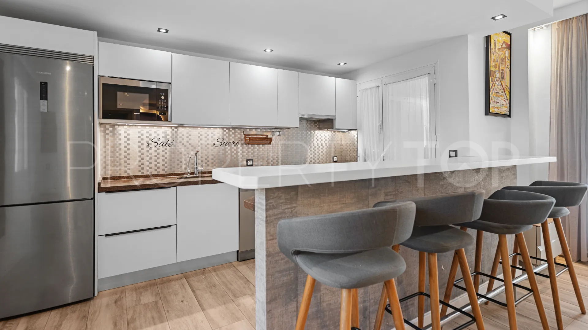 Comprar apartamento planta baja en Los Naranjos de Marbella