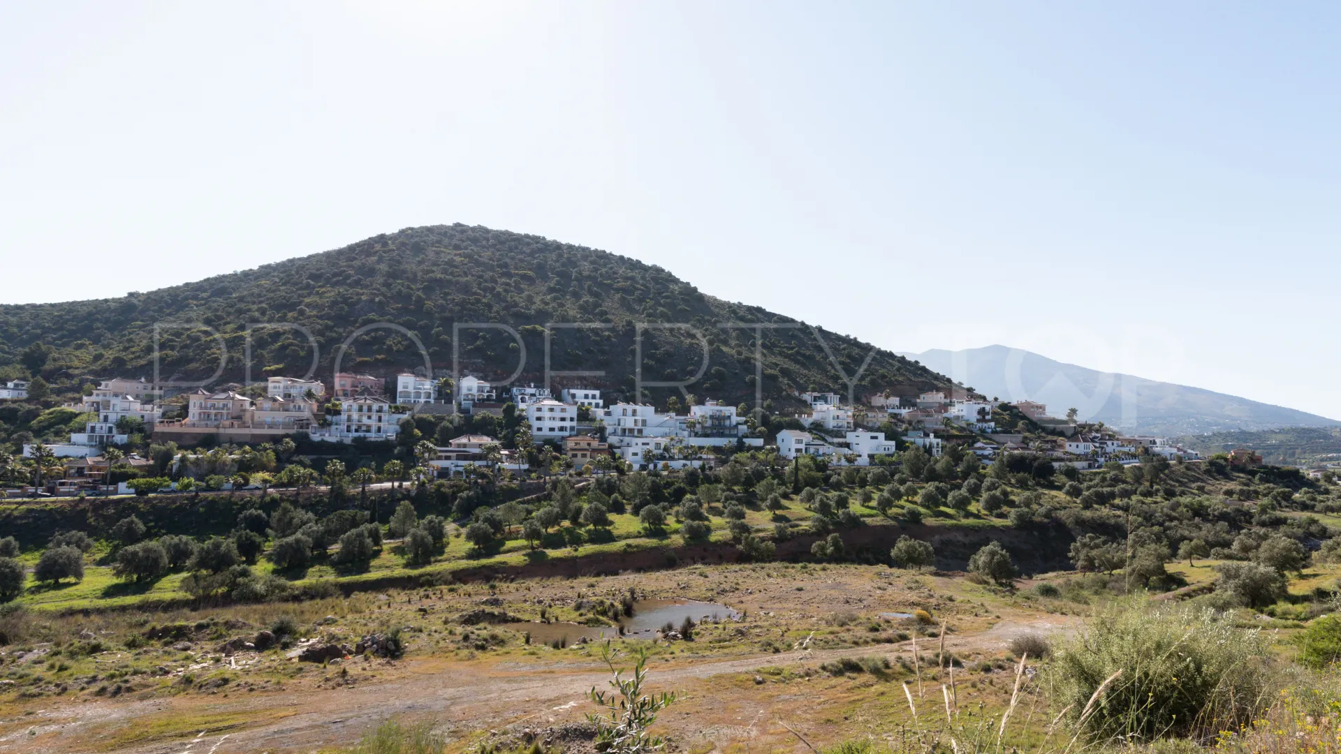 Plot for sale in Coin