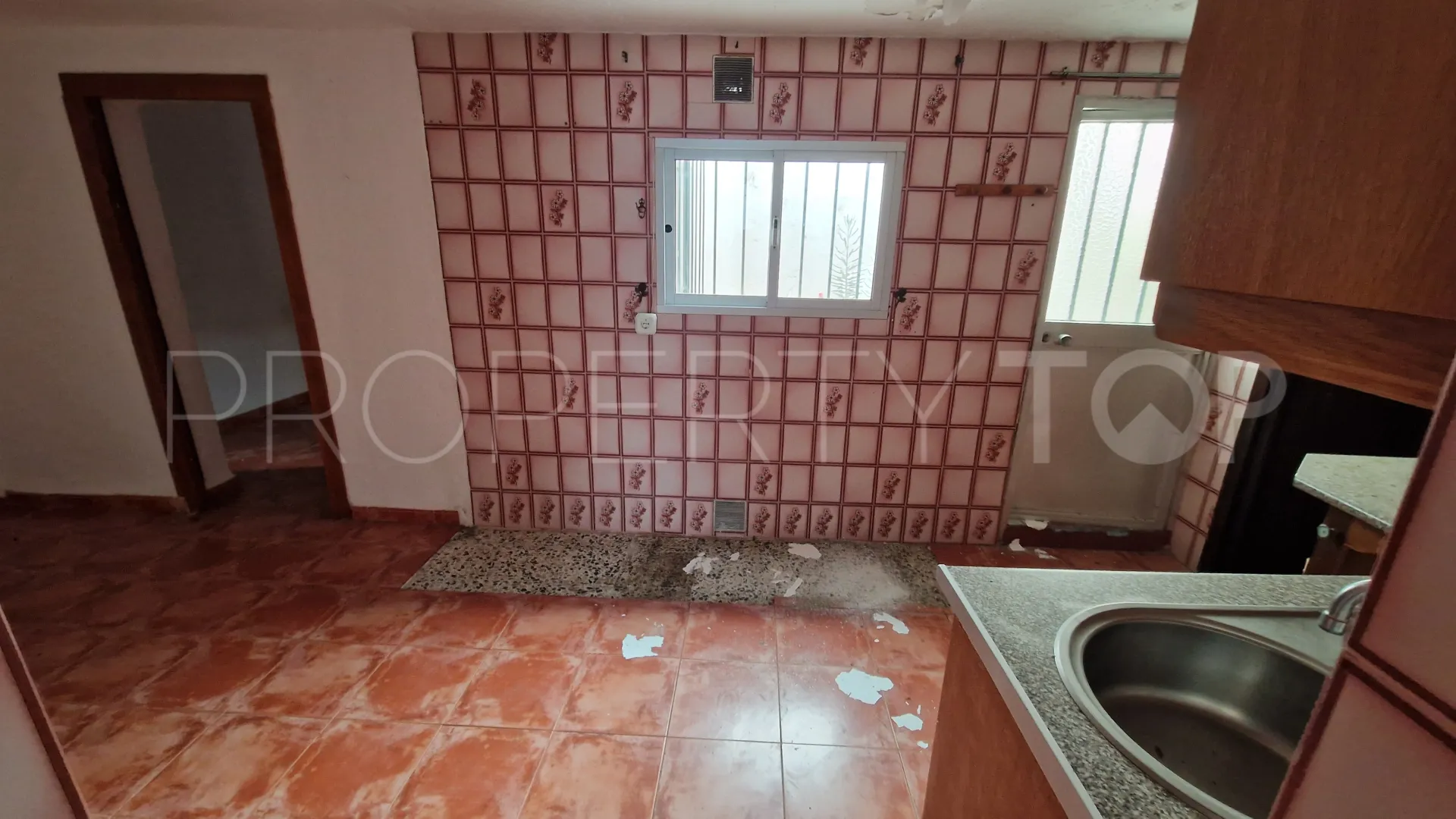Comprar adosado de 2 dormitorios en Sabinillas