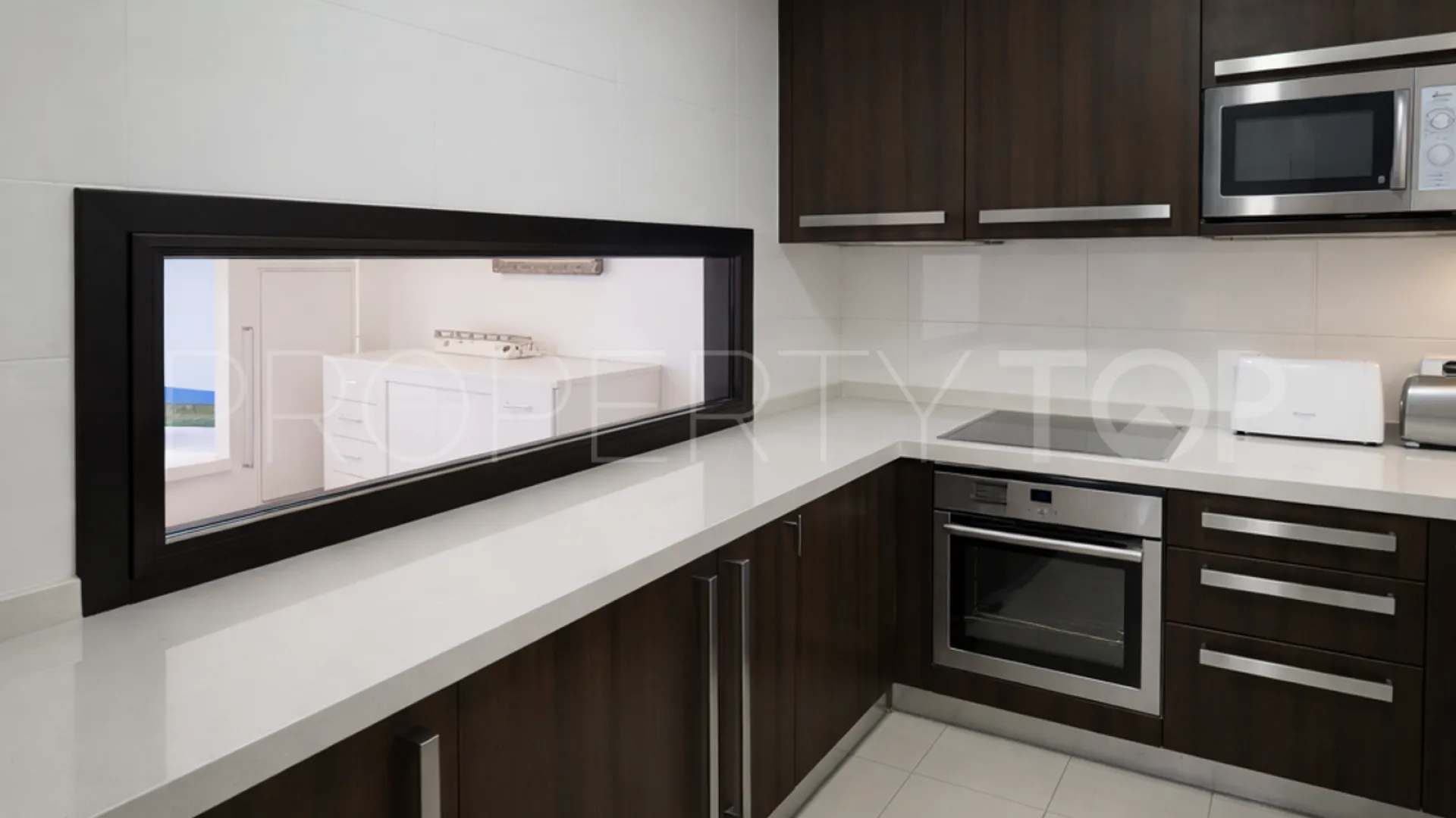 Se vende apartamento planta baja en Casares Playa de 2 dormitorios