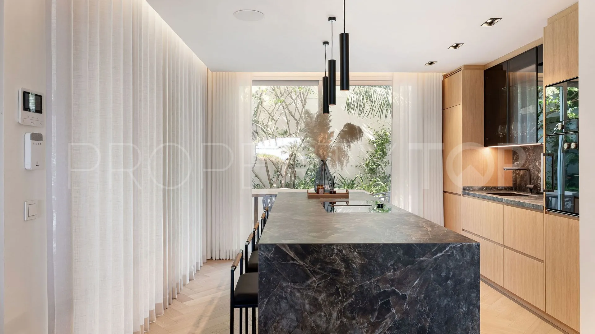 Comprar villa pareada en Marbella