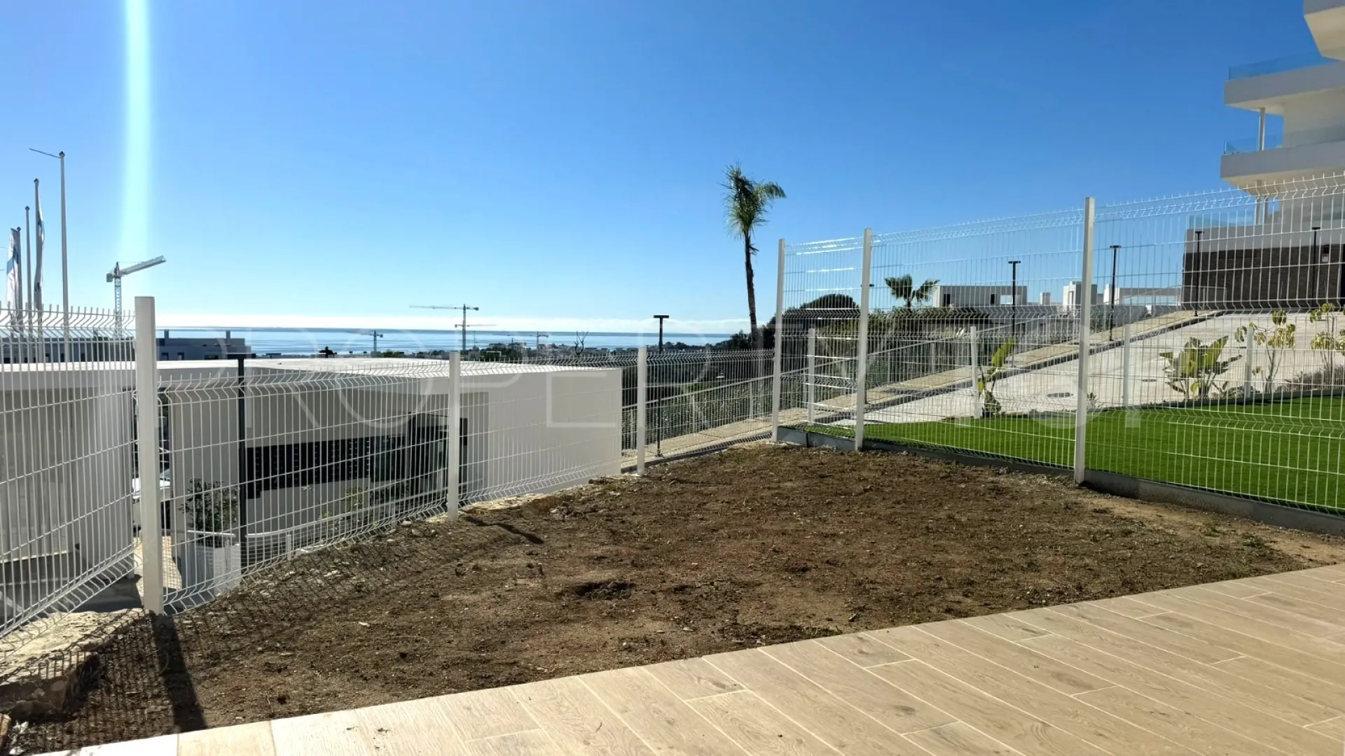 Buy Estepona ground floor apartment with 2 bedrooms