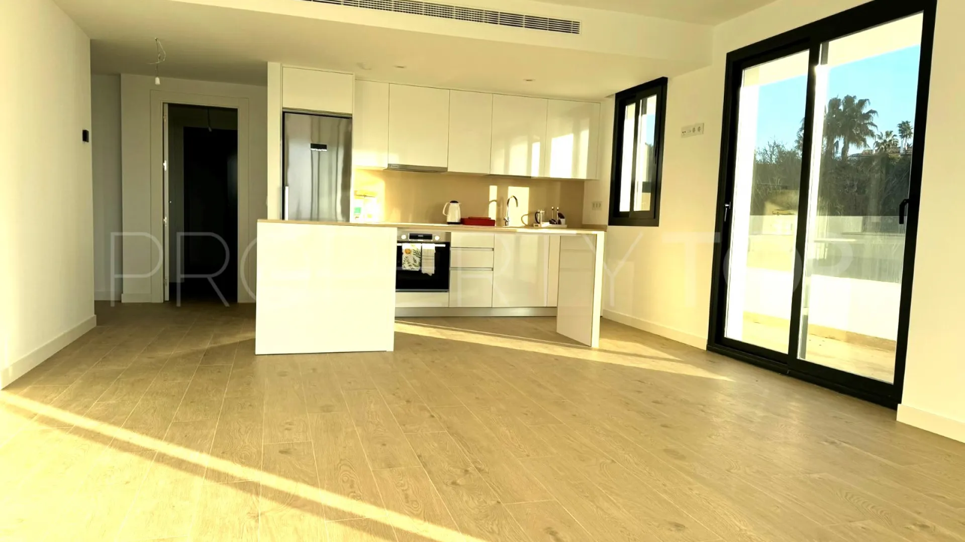 Buy Estepona ground floor apartment with 2 bedrooms