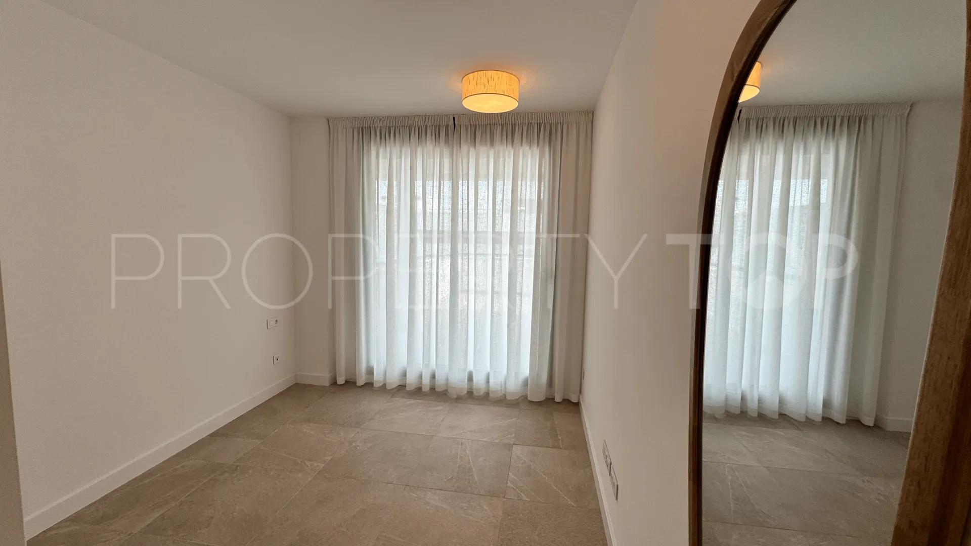 For sale Estepona Town ground floor apartment with 2 bedrooms