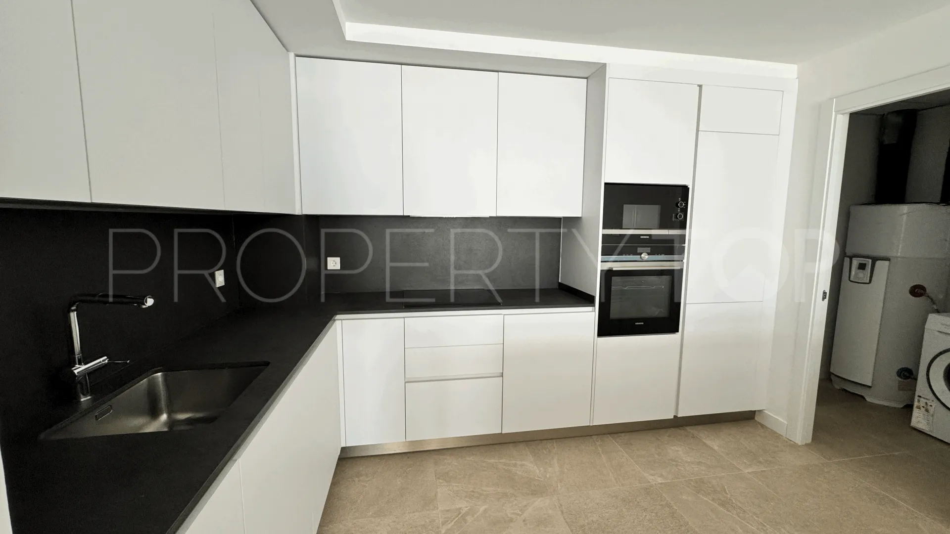 For sale Estepona Town ground floor apartment with 2 bedrooms