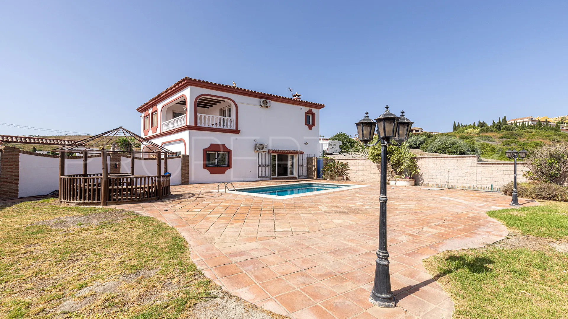 Villa en venta con 4 dormitorios en Manilva