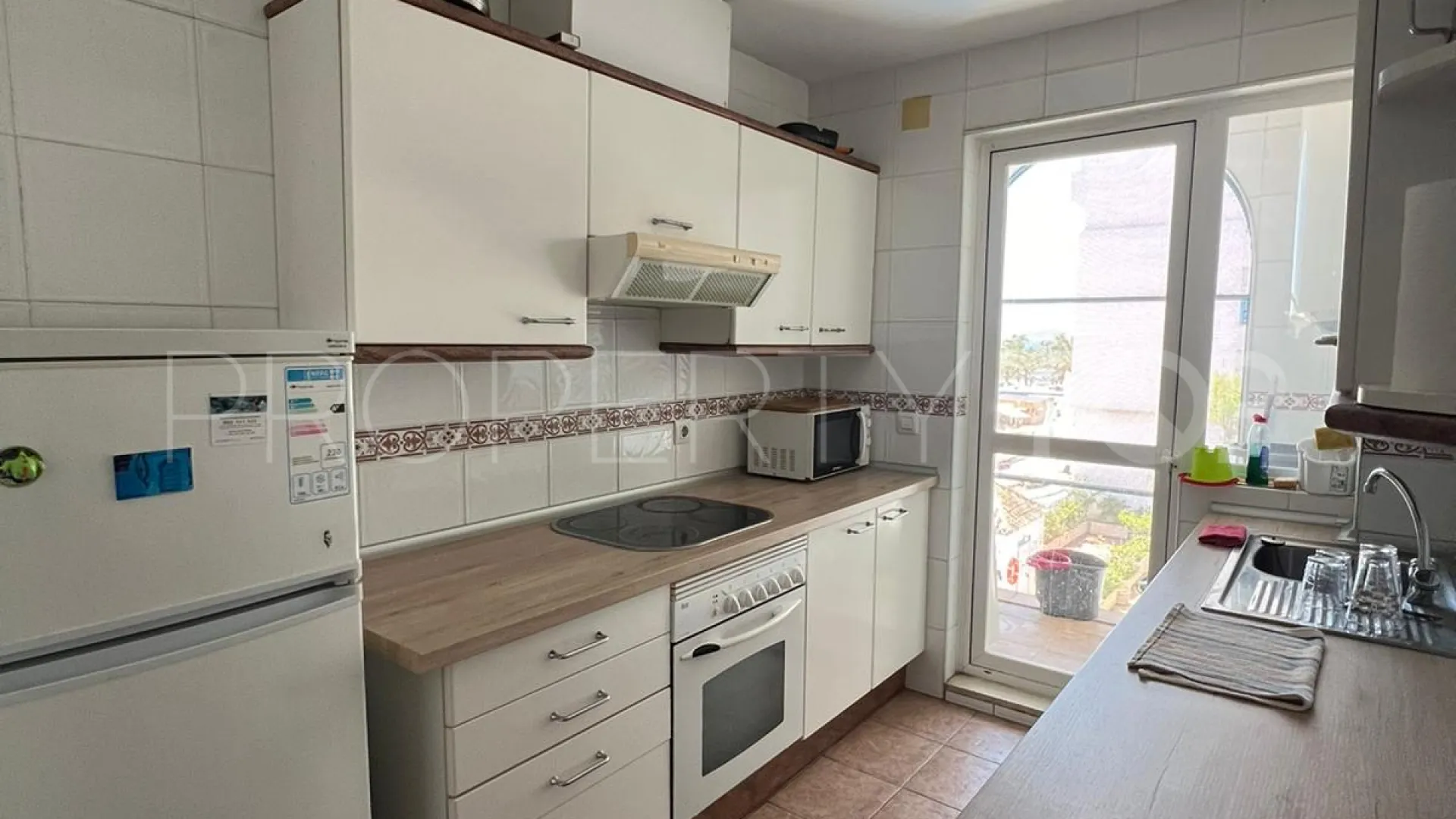Buy apartment in Estepona