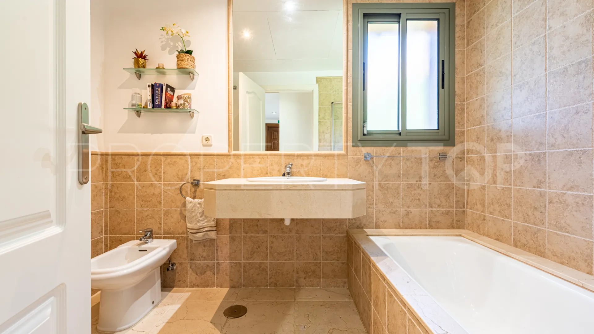 Ground floor apartment for sale in New Golden Mile with 2 bedrooms