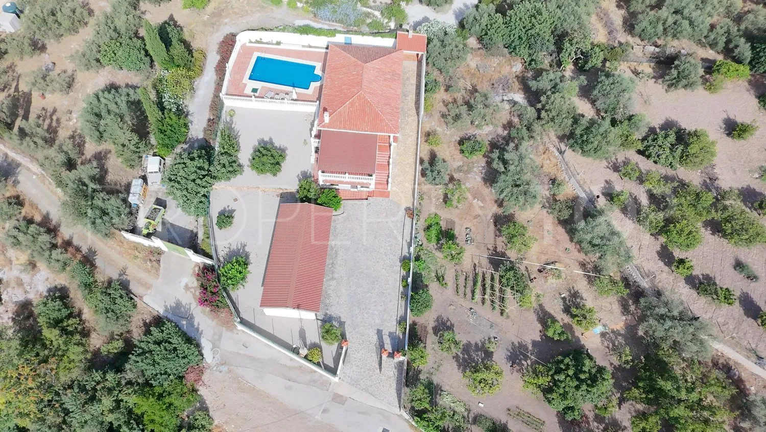 Casa de campo de 4 dormitorios a la venta en Periana