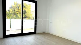Buy Estepona ground floor apartment with 2 bedrooms