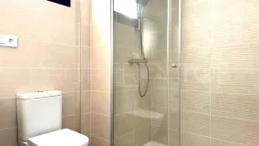 Buy Estepona ground floor apartment with 2 bedrooms